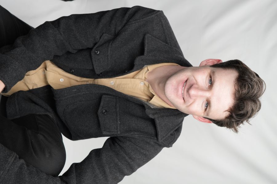 Brenton Bender grew up in San Diego after his family relocated from the East headshot